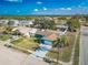 Aerial view of home, highlighting mature landscaping, and surrounding neighborhood at 2402 16Th W St, Palmetto, FL 34221