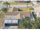 Overhead view showcasing a property's layout, landscaping, and placement within a residential area at 2402 16Th W St, Palmetto, FL 34221