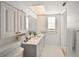 This bathroom has a double sink vanity and a shower at 2402 16Th W St, Palmetto, FL 34221