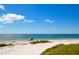 Beautiful beach with a serene view and clear blue skies on a sunny day at 2402 16Th W St, Palmetto, FL 34221