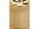 A bedroom with ceiling fan and tile floors at 2402 16Th W St, Palmetto, FL 34221