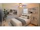 Staged bedroom with a comfortable bed, artwork, and modern furnishings at 2402 16Th W St, Palmetto, FL 34221