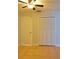 A clean bedroom with ceiling fan, closet, and tile floors at 2402 16Th W St, Palmetto, FL 34221