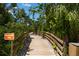 Scenic boardwalk to the observation tower surrounded by lush vegetation at 2402 16Th W St, Palmetto, FL 34221