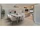 Bright dining room with tile flooring, a modern light fixture, and an island at 2402 16Th W St, Palmetto, FL 34221