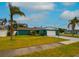 Charming single Gathering home with a well-manicured lawn and beautiful landscaping at 2402 16Th W St, Palmetto, FL 34221