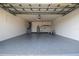 Bright and clean two-car garage with epoxy floor, with utility sink and water heater at 2402 16Th W St, Palmetto, FL 34221