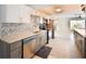 Contemporary kitchen boasting modern appliances, light countertops, and gray cabinets at 2402 16Th W St, Palmetto, FL 34221