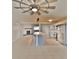 Open kitchen with stainless steel appliances, tile flooring, and a large island, perfect for entertaining at 2402 16Th W St, Palmetto, FL 34221