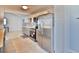 Well-equipped kitchen featuring stainless steel appliances and open floor plan with convenient tile floors at 2402 16Th W St, Palmetto, FL 34221