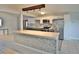Modern kitchen with stainless steel appliances, quartz countertops, and an open layout for easy entertaining at 2402 16Th W St, Palmetto, FL 34221