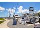 Scenic marina view showcasing multiple boats docked against a backdrop of a partly cloudy sky at 2402 16Th W St, Palmetto, FL 34221