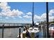 Picturesque view of a sailboat docked at a pier, featuring a calm water view with cloudy sky at 2402 16Th W St, Palmetto, FL 34221
