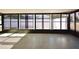 Enclosed patio features full walls of windows and a speckled floor at 2402 16Th W St, Palmetto, FL 34221