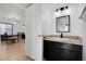 Bathroom with stylish vanity, black hardware, and mirror at 2415 Bayshore Gardens Pkwy # 8, Bradenton, FL 34207
