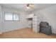 Bedroom with modern loft bed, laminate floors, and natural light at 2415 Bayshore Gardens Pkwy # 8, Bradenton, FL 34207