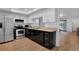 Well-maintained kitchen with black and white cabinets and appliances at 2415 Bayshore Gardens Pkwy # 8, Bradenton, FL 34207