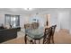 Open-concept living and dining area with ample natural light at 2415 Bayshore Gardens Pkwy # 8, Bradenton, FL 34207