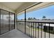 Screened patio overlooking lush greenery at 2415 Bayshore Gardens Pkwy # 8, Bradenton, FL 34207