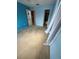 Bedroom featuring neutral carpet, blue walls, and an attached closet at 2808 60Th W Ave # 1924, Bradenton, FL 34207