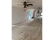 Large living room with neutral carpeting, ceiling fan, and mirrored wall accents at 2808 60Th W Ave # 1924, Bradenton, FL 34207