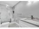 Elegant bathroom features a glass-enclosed shower, sleek vanity, and modern fixtures at 3021 Leila Estelle Dr, Plant City, FL 33565