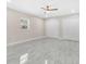Spacious bedroom features tile floors, natural light and double closet at 3021 Leila Estelle Dr, Plant City, FL 33565