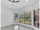 Bright bedroom with large windows offering views of the well-manicured front lawn at 3021 Leila Estelle Dr, Plant City, FL 33565