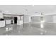 Expansive open-concept living area with new flooring offers versatile living space and design potential at 3021 Leila Estelle Dr, Plant City, FL 33565