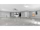 Open-concept living space with new flooring connects living and dining areas at 3021 Leila Estelle Dr, Plant City, FL 33565