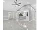 Open concept living with updated kitchen, fireplace, tile floors, and lots of natural light at 3021 Leila Estelle Dr, Plant City, FL 33565