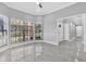 Bright living room features large windows, tile floors and neutral paint at 3021 Leila Estelle Dr, Plant City, FL 33565