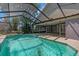 Inviting screened-in pool and patio area offer a perfect space for outdoor enjoyment at 3021 Leila Estelle Dr, Plant City, FL 33565