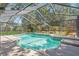 Beautiful screened-in pool with lush landscaping creates a private oasis for relaxation at 3021 Leila Estelle Dr, Plant City, FL 33565