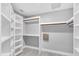 Spacious walk-in closet with ample shelving and storage space, perfect for organization at 3021 Leila Estelle Dr, Plant City, FL 33565