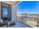 Balcony view of cityscape, offering a serene outdoor living space with comfortable seating at 33 S Palm Ave # 1403, Sarasota, FL 34236