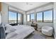 Bright bedroom with large windows offering city views, featuring modern furnishings and decor at 33 S Palm Ave # 1403, Sarasota, FL 34236