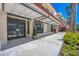 Charming exterior of building with awnings, lush landscaping, and storefront windows offers retail opportunities at 33 S Palm Ave # 1403, Sarasota, FL 34236