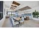 Spacious living room with an open floor plan, tile floors, and abundant light from large windows at 33 S Palm Ave # 1403, Sarasota, FL 34236