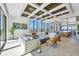 Elegant living room featuring a stylish ceiling design and floor-to-ceiling windows at 33 S Palm Ave # 1403, Sarasota, FL 34236