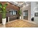 Elegant building lobby with stylish lighting, wood accents, and patterned floors offers modern appeal at 33 S Palm Ave # 1403, Sarasota, FL 34236