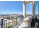 Stunning balcony with seating and panoramic city views under a clear blue sky at 33 S Palm Ave # 1702, Sarasota, FL 34236