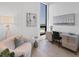Cozy office with a desk, chair, and a scenic view from the large window at 33 S Palm Ave # 1702, Sarasota, FL 34236