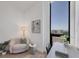 Cozy office with a desk, chair, and a scenic view from the large window at 33 S Palm Ave # 1702, Sarasota, FL 34236