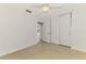 Bright bedroom with a ceiling fan and access to the rest of the house at 3599 Bali Dr, Sarasota, FL 34232