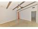 Spacious bedroom featuring beamed ceiling, sleek floors and bright natural light at 3599 Bali Dr, Sarasota, FL 34232