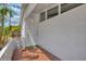 Charming tiled entryway and patterned front door at 3599 Bali Dr, Sarasota, FL 34232