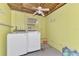 Bright laundry room equipped with new washer and dryer units at 3599 Bali Dr, Sarasota, FL 34232