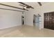 Open living room featuring beamed ceilings and sleek floors at 3599 Bali Dr, Sarasota, FL 34232