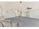 Well-lit sunroom with four ceiling fans and ample natural light at 3599 Bali Dr, Sarasota, FL 34232